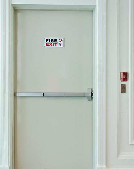 Fire exit door fitted with panic hardware