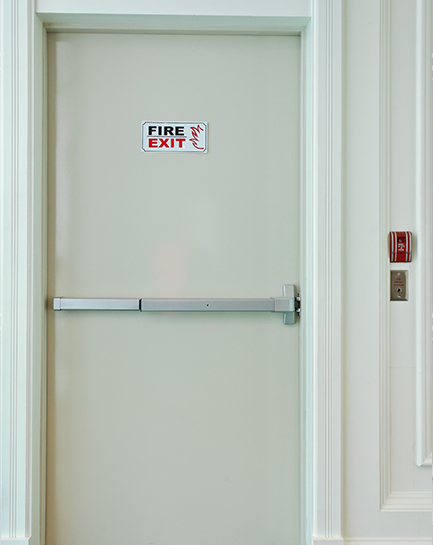 Fire exit door fitted with panic hardware
