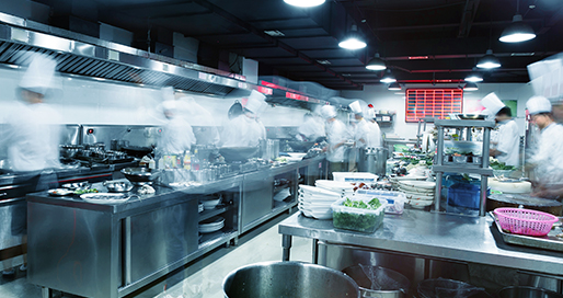 Busy commercial kitchen protected by a suppression system